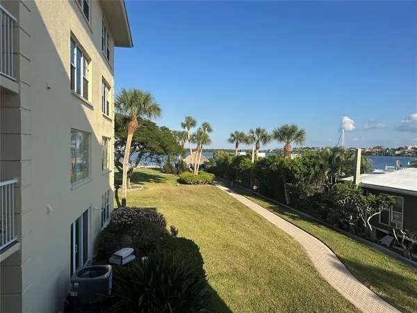 a view of a lake with a big yard
