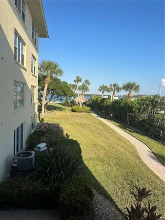 a view of an ocean and city