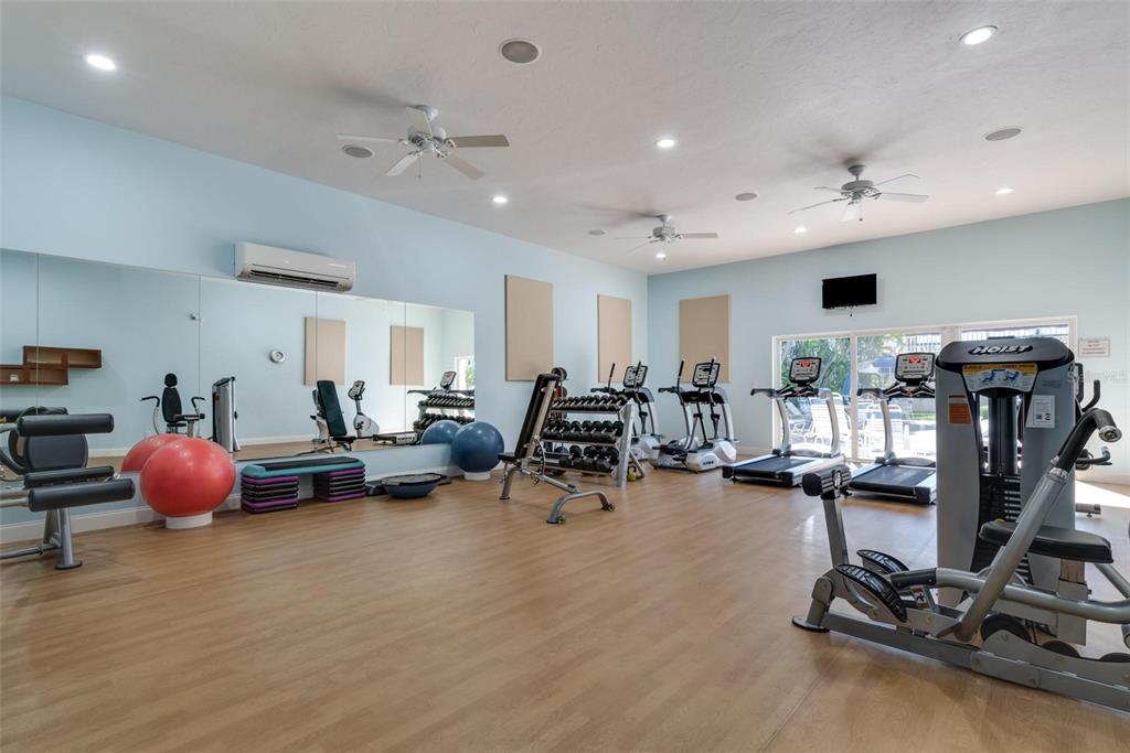 3808 Gulf Of Mexico Drive, Unit E211 Longboat Key, FL 34228 - Photo 34 of 34 a view of a room with gym equipment
