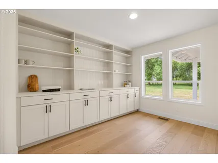 a room with cabinets and window