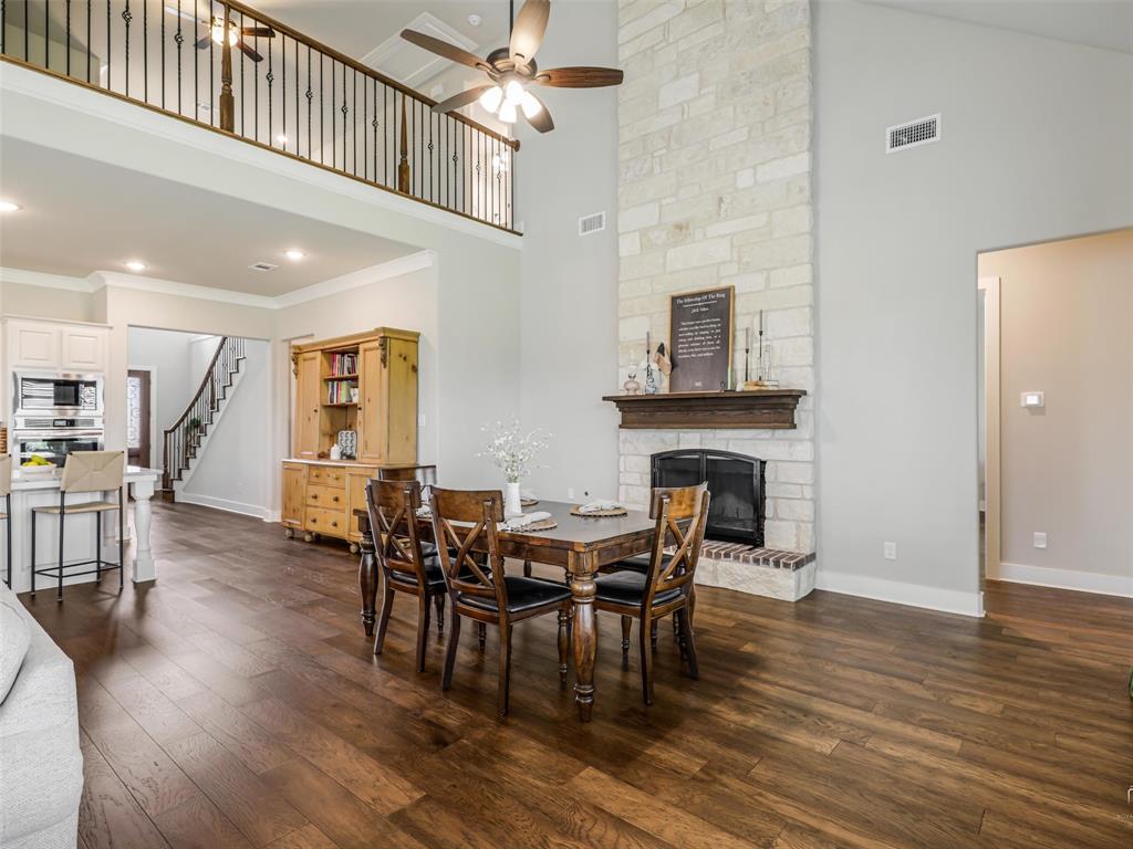 544 Majors Road Van Alstyne, TX 75495 - Photo 35 of 36 a view of a dining room with furniture and wooden floor
