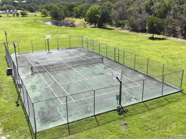 a view of a park with swings and slides