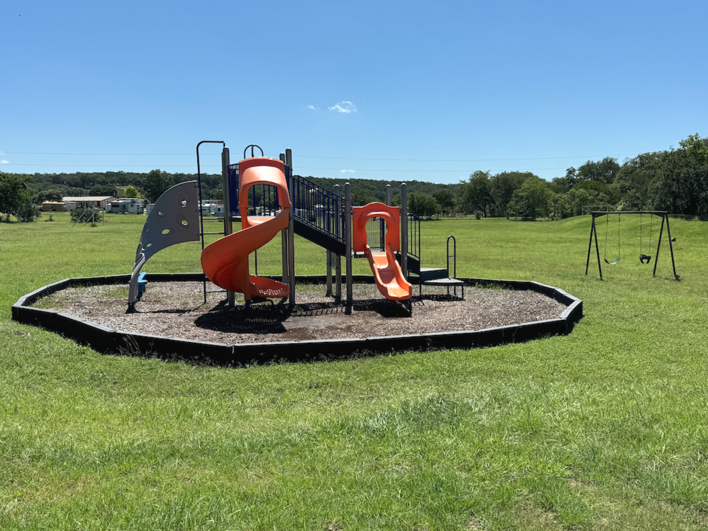 815 Winding River Lane Spring Branch, TX 78070 - Photo 7 of 9 a view of a park with swings and slides