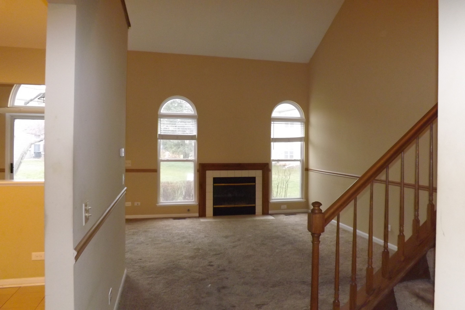 1078 Stillwater Road Elgin, IL 60120 - Photo 2 of 13 a view of a livingroom with a fireplace