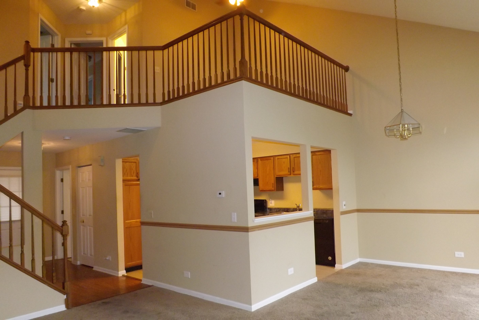 1078 Stillwater Road Elgin, IL 60120 - Photo 5 of 13 a view of a hallway with wooden floor