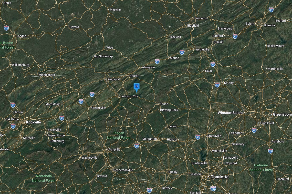 107 Hemlock Drive Butler, TN 37640 - Photo 4 of 4 a bathroom with a shower and a tiled wall