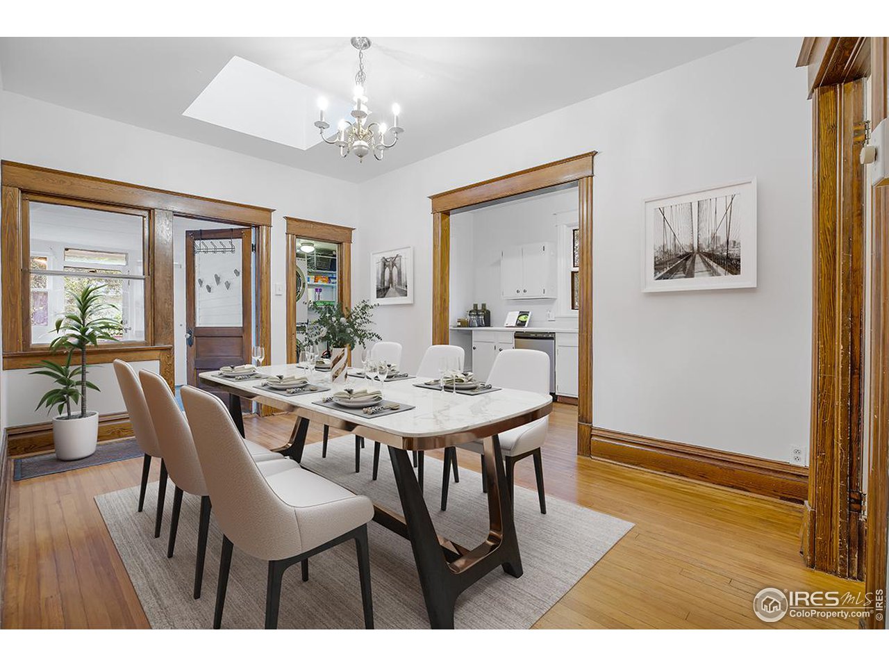 969 10th Street Boulder, CO 80302 - Photo 14 of 40 a view of a dining room with furniture and wooden floor