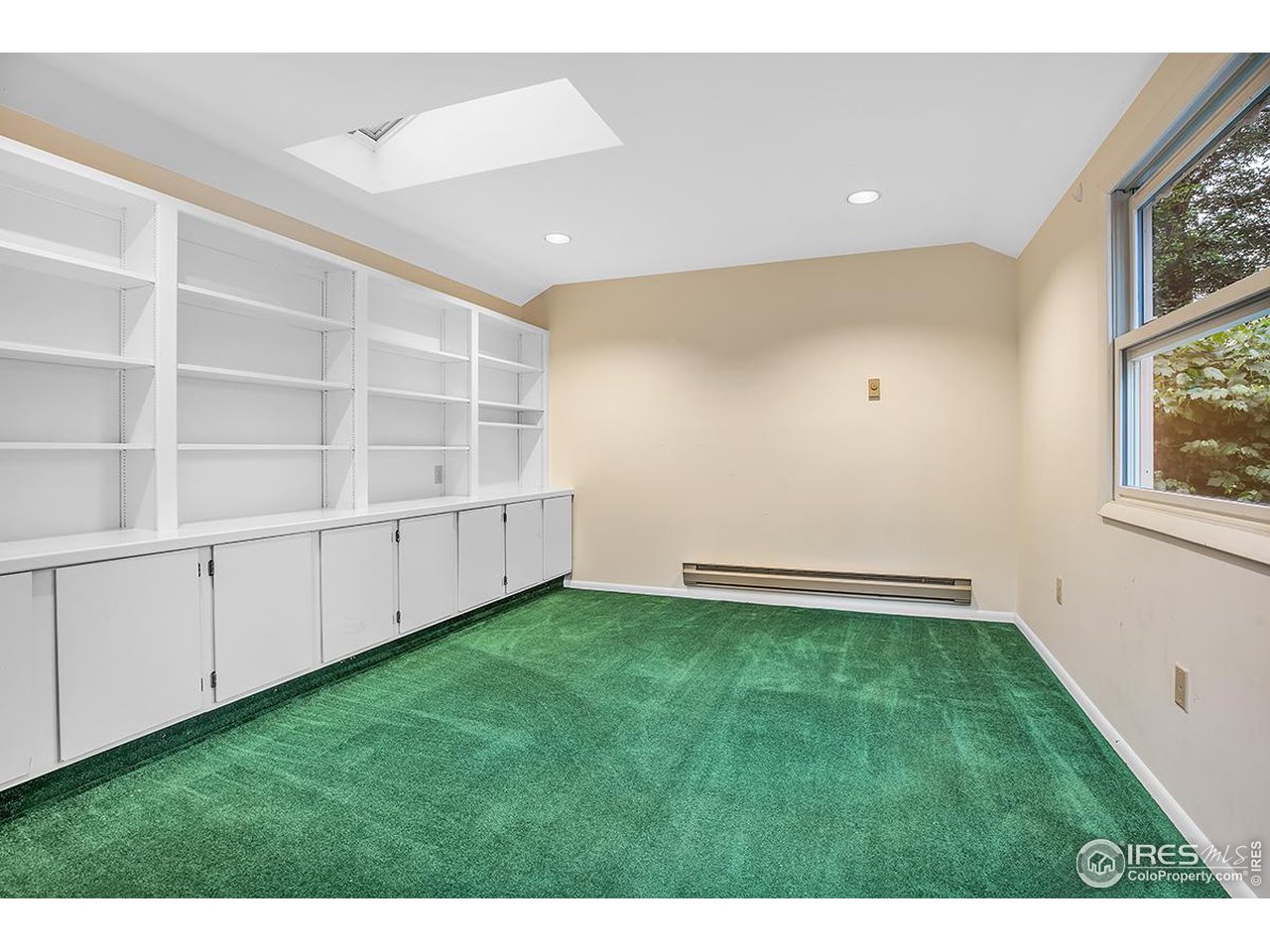 969 10th Street Boulder, CO 80302 - Photo 32 of 40 a view of an empty room with a window