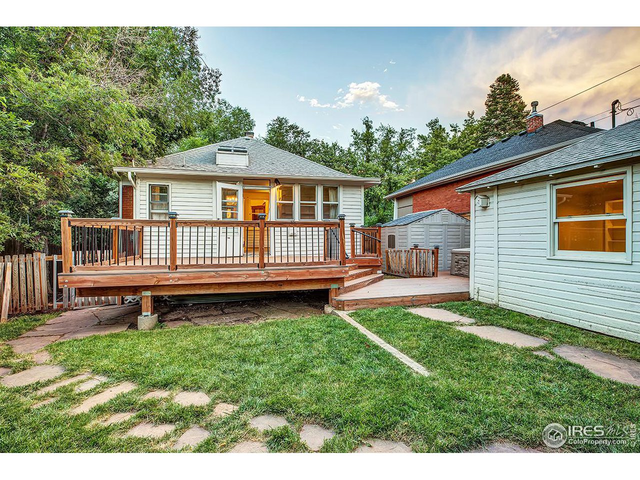 969 10th Street Boulder, CO 80302 - Photo 34 of 40 a view of a house with a yard and deck