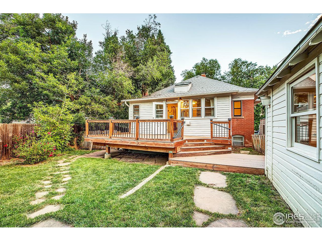 969 10th Street Boulder, CO 80302 - Photo 35 of 40 a front view of a house with a yard