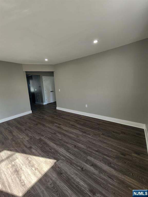 93 Hughes Street, Unit 3 Maplewood, NJ 07040 - Photo 21 of 23 an empty room with wooden floor