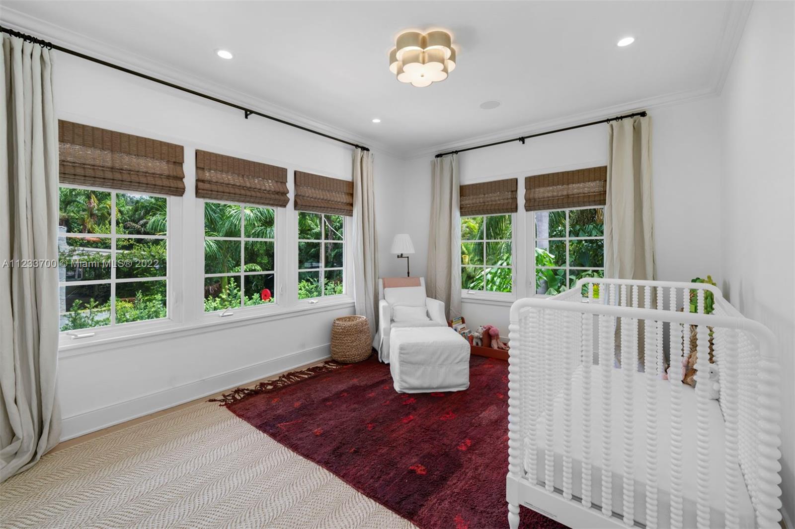 3618 St Gaudens Road Miami, FL 33133 - Photo 24 of 38 a living room with furniture and a large window