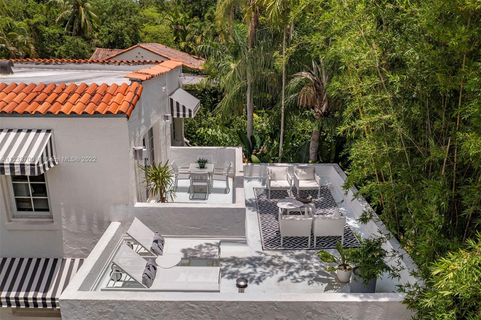 3618 St Gaudens Road Miami, FL 33133 - Photo 28 of 38 an aerial view of a house with yard and patio