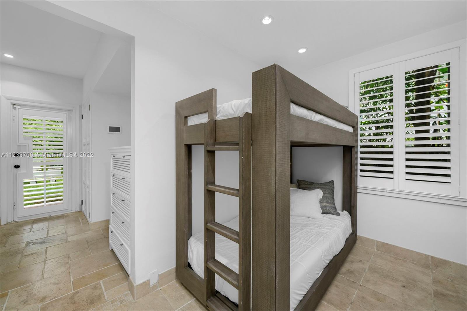 3618 St Gaudens Road Miami, FL 33133 - Photo 36 of 38 a en suite bathroom with a shower and a sink