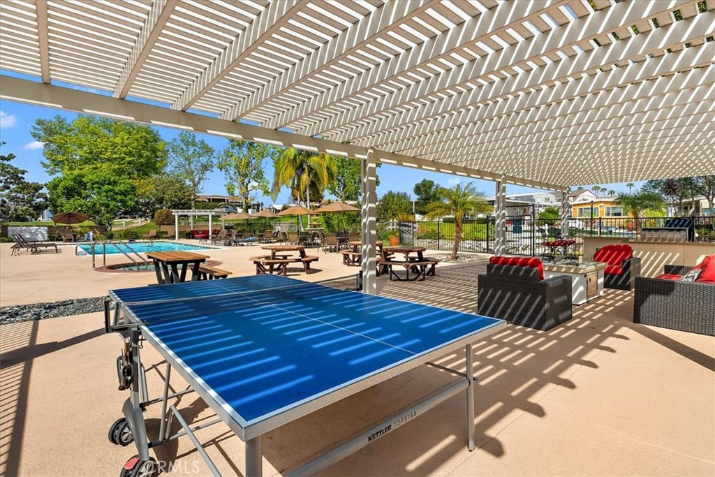 1001 West Lambert Road, Unit 110 La Habra, CA 90631 - Photo 26 of 39 a view of a swimming pool with a patio