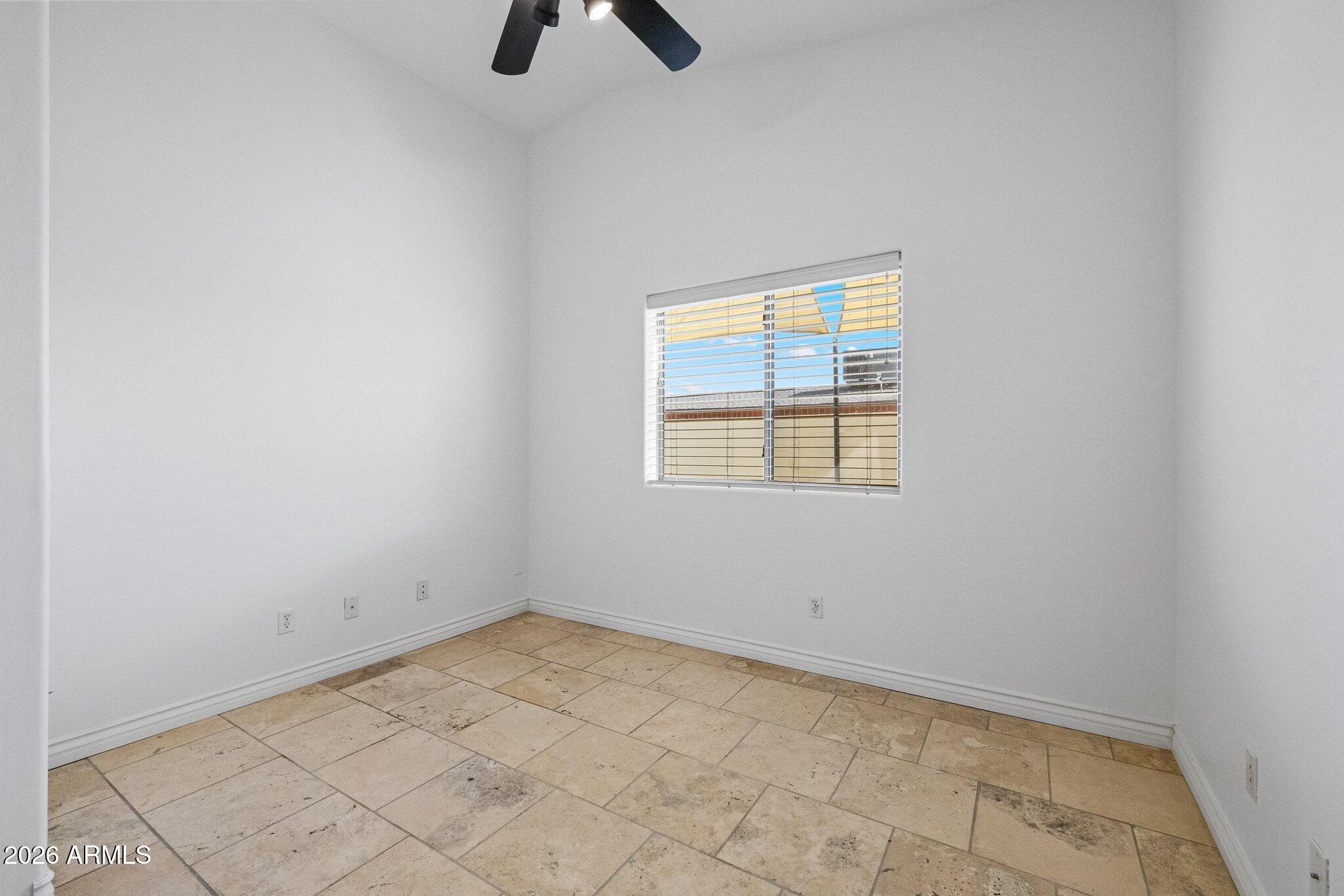 5233 North 15th Street Phoenix, AZ 85014 - Photo 18 of 26 an empty room with windows
