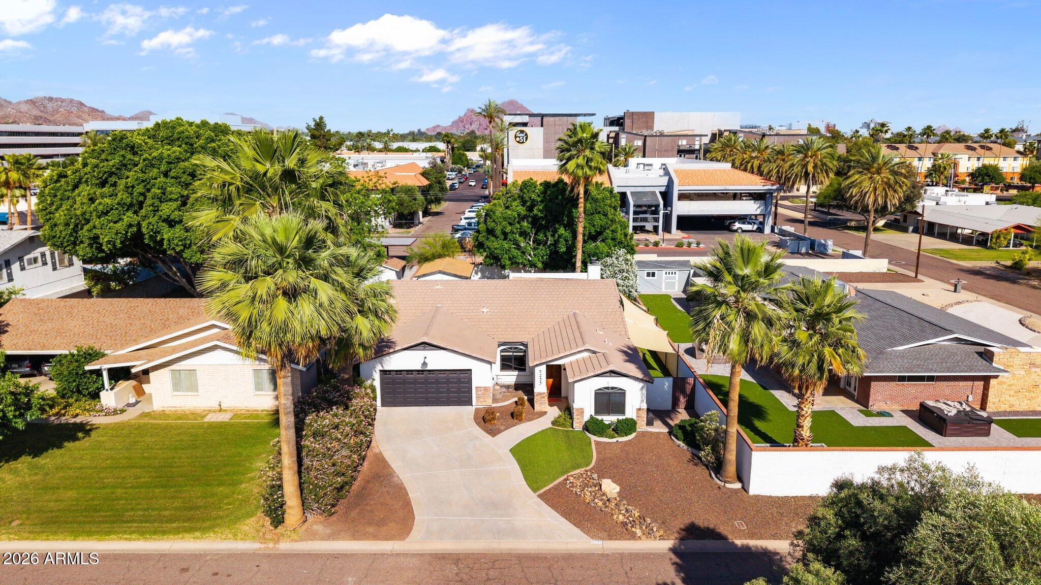 5233 North 15th Street Phoenix, AZ 85014 - Photo 2 of 26 an aerial view of a house with a yard basket ball court and outdoor seating