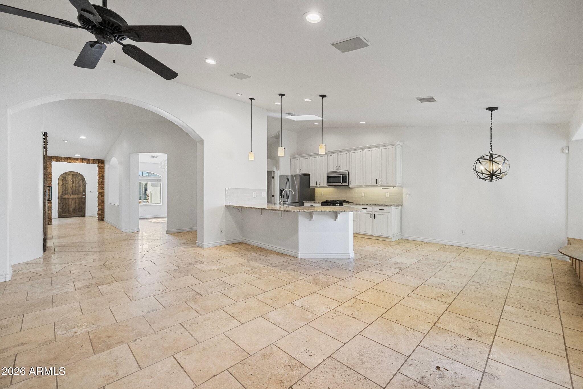 5233 North 15th Street Phoenix, AZ 85014 - Photo 3 of 26 a view of a kitchen with furniture and a kitchen view