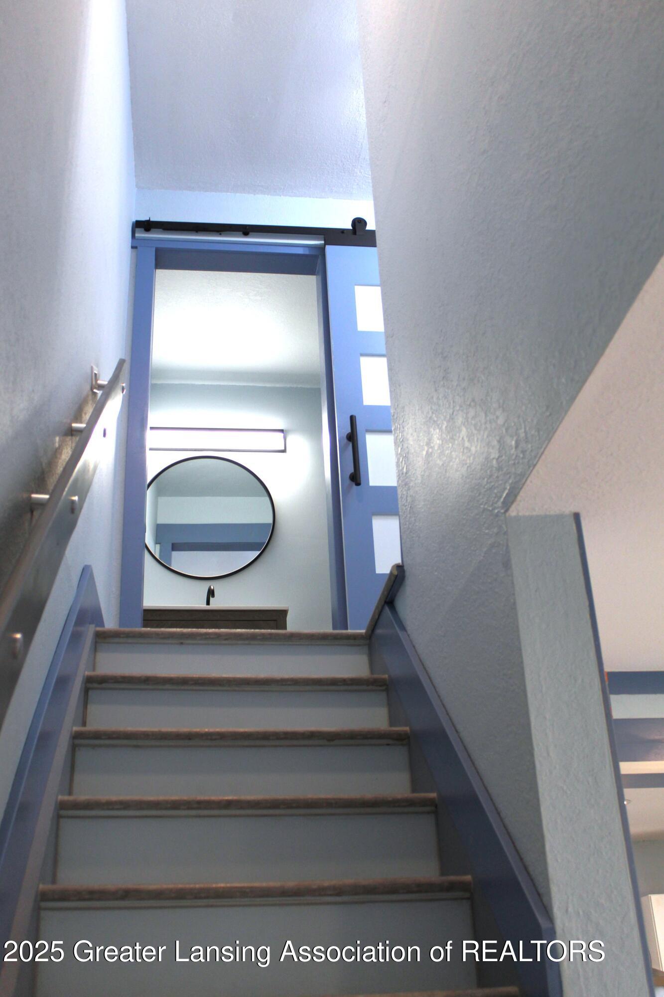 3922 Hunters Ridge Drive, Unit 3 Lansing, MI 48911 - Photo 15 of 44 stairs to 2nd level