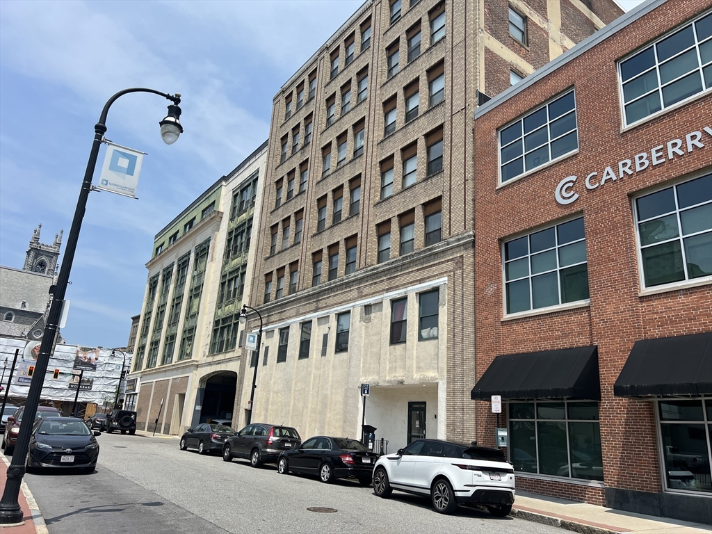 17 Federal Street, Unit 606 Worcester, MA 01608 - Photo 1 of 24 a car parked in front of a building