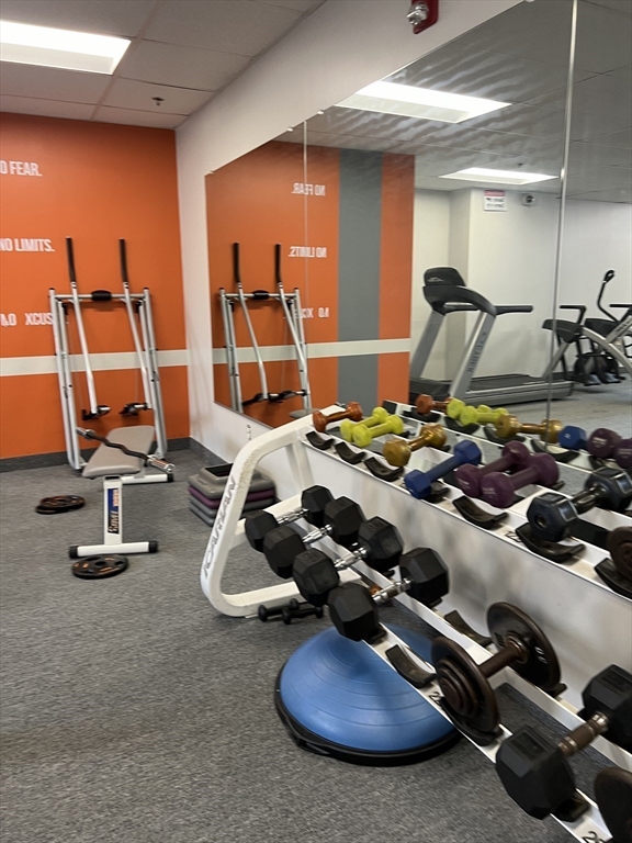 17 Federal Street, Unit 606 Worcester, MA 01608 - Photo 22 of 24 a room with gym equipment and lots of equipment