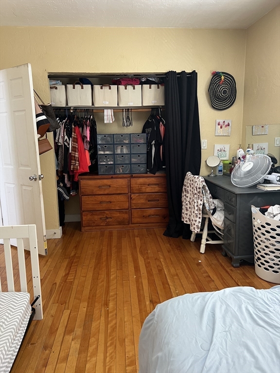 17 Federal Street, Unit 606 Worcester, MA 01608 - Photo 10 of 24 a view of a living room and wooden floor