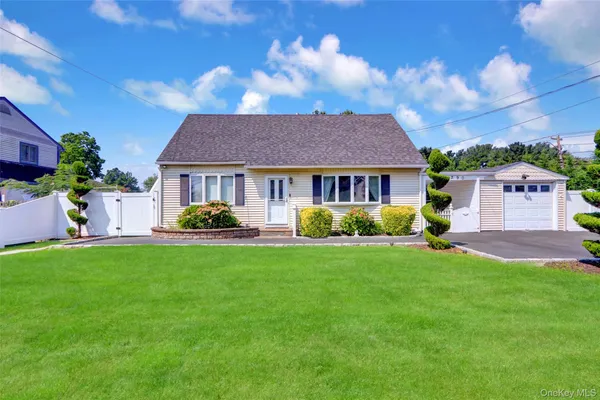 a house view with a garden space