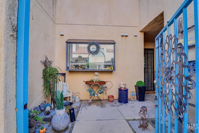 a view of entryway with flower pots