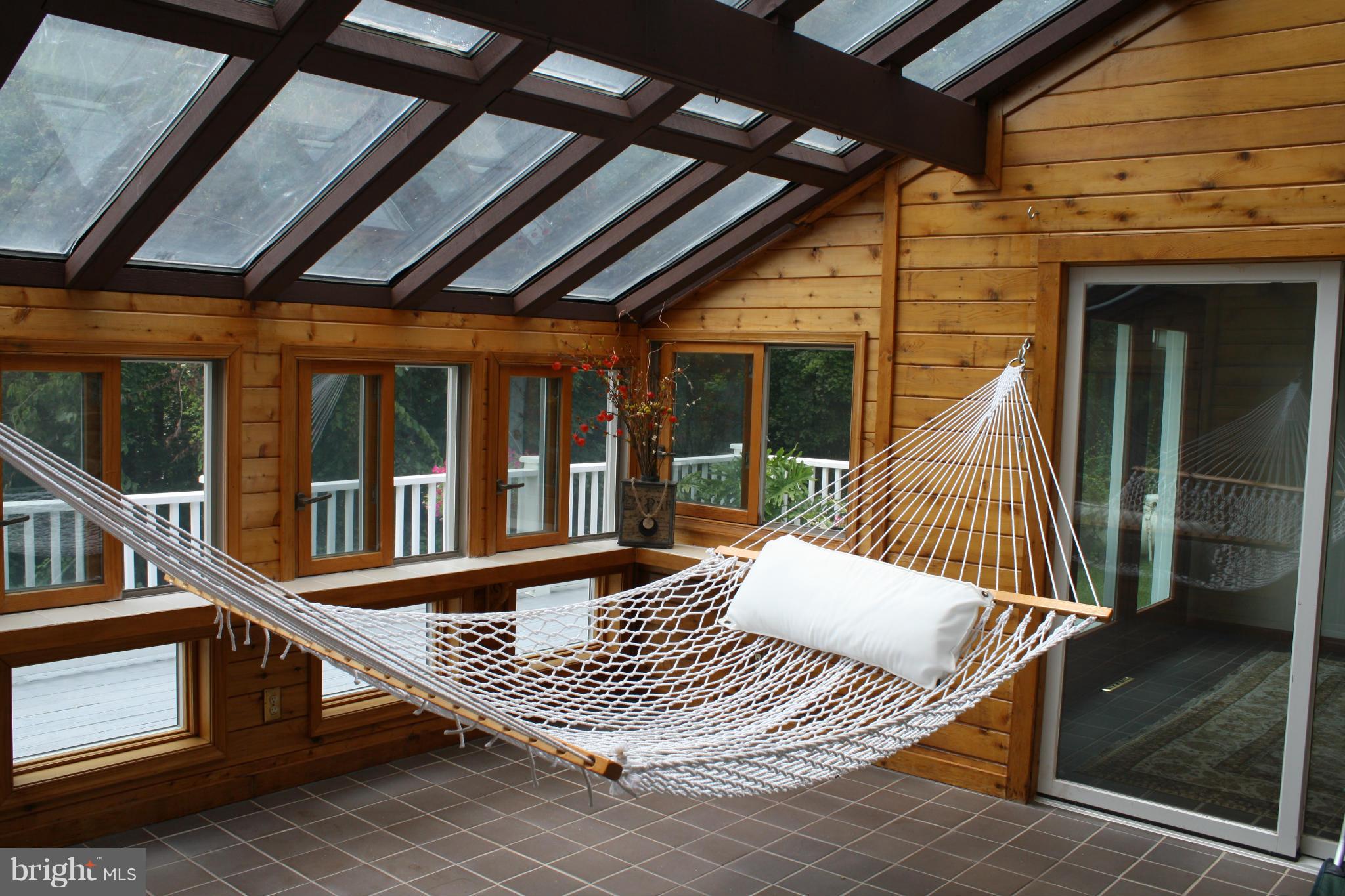 20169 Woodtrail Road Round Hill, VA 20141 - Photo 5 of 17 Passive solar sun room