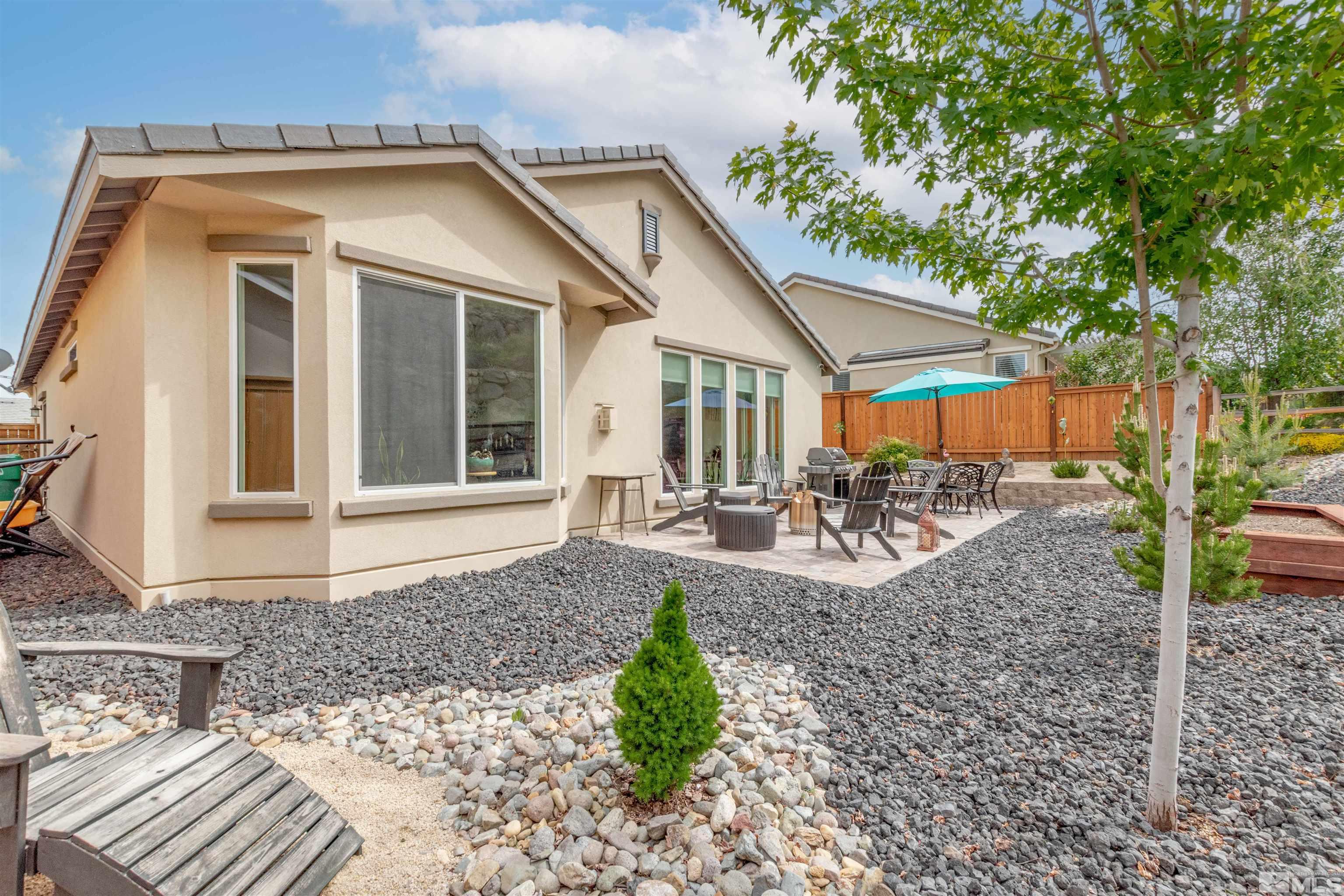 1180 Wakefield Trail Reno, NV 89523 - Photo 21 of 21 a front view of a house with garden