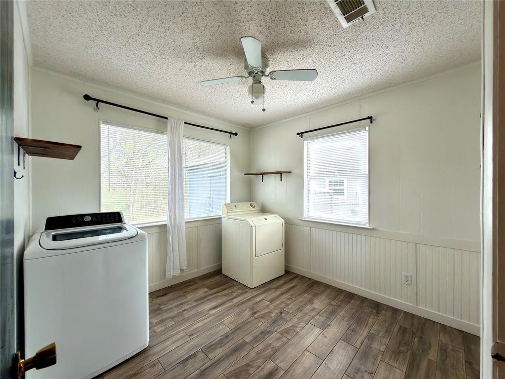 170 Granada Street Payne Springs, TX 75156 - Photo 14 of 20 a room with storage and utility