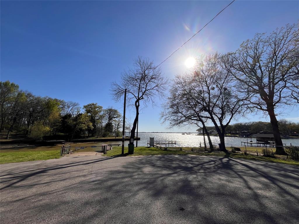 170 Granada Street Payne Springs, TX 75156 - Photo 20 of 20 a view of street with trees