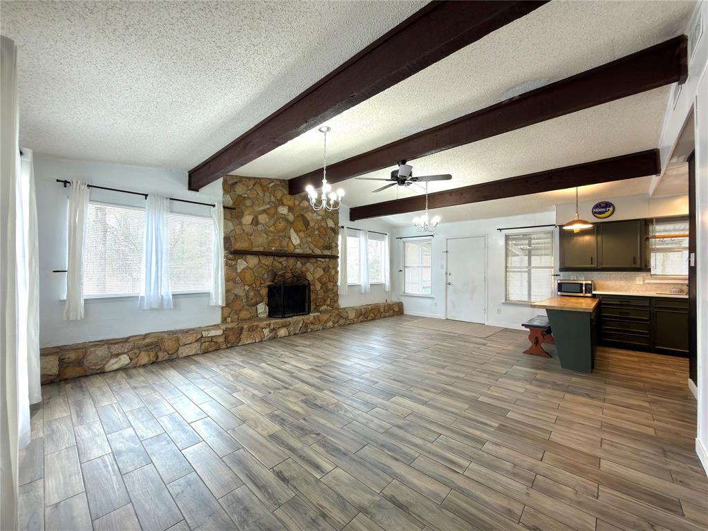 170 Granada Street Payne Springs, TX 75156 - Photo 6 of 20 a view of living room with furniture and flat screen tv
