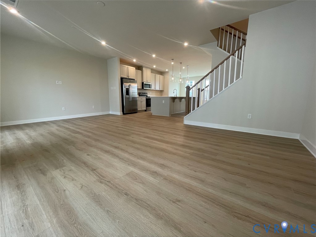 2860 Calgary Lane Chester, VA 23831 - Photo 1 of 16 a view of entryway and hall with wooden floor