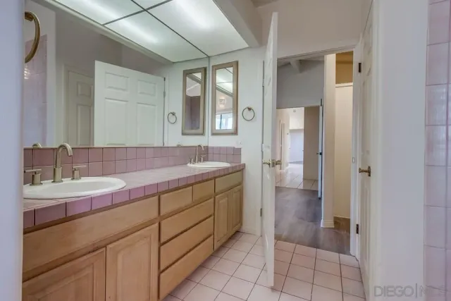 a view of a kitchen with a stove cabinets and a wooden floor