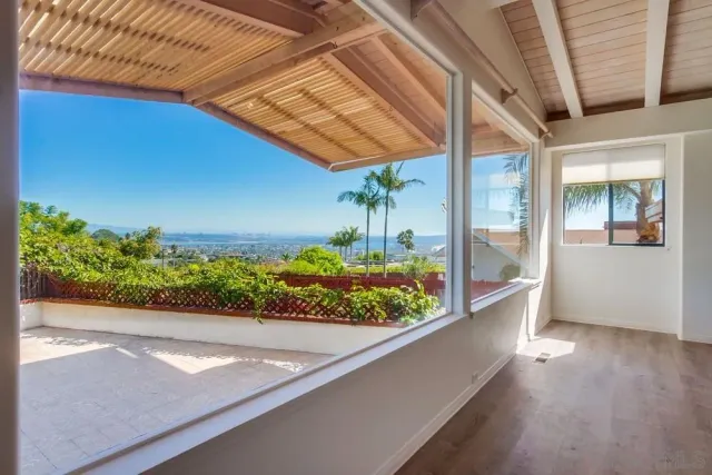 a view of an empty room and window