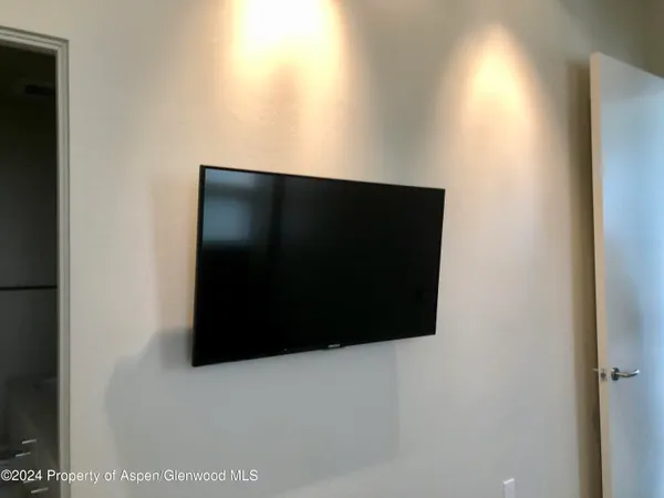 a view of a living room with a window