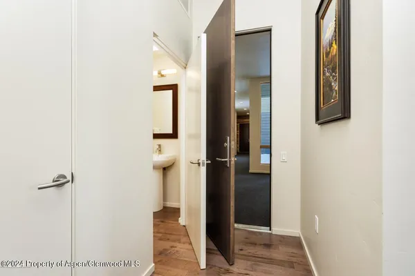 a view of empty room with floor to ceiling window