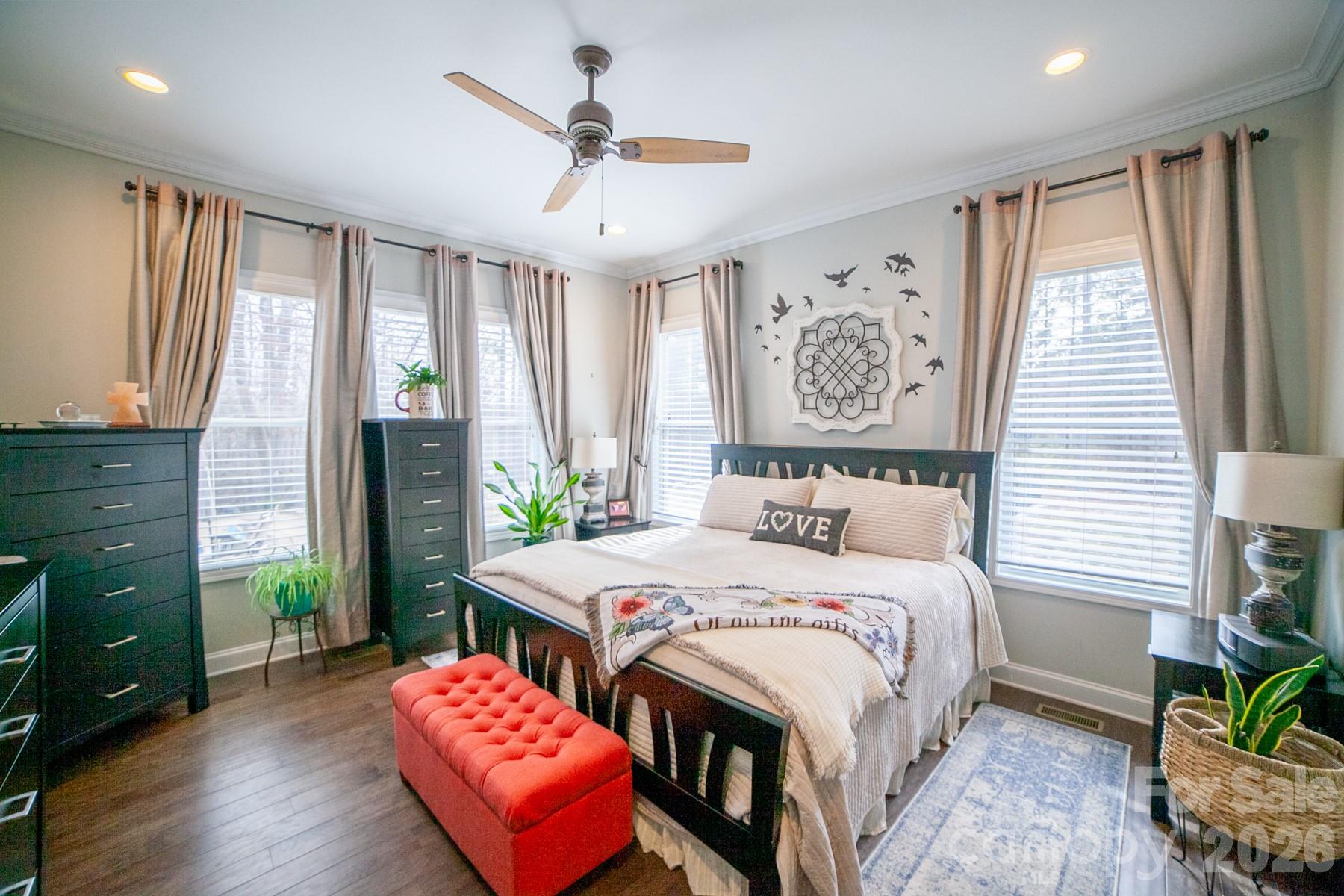 790 Brandon Road Clover, SC 29710 - Photo 15 of 48 a bedroom with a bed and a chandelier