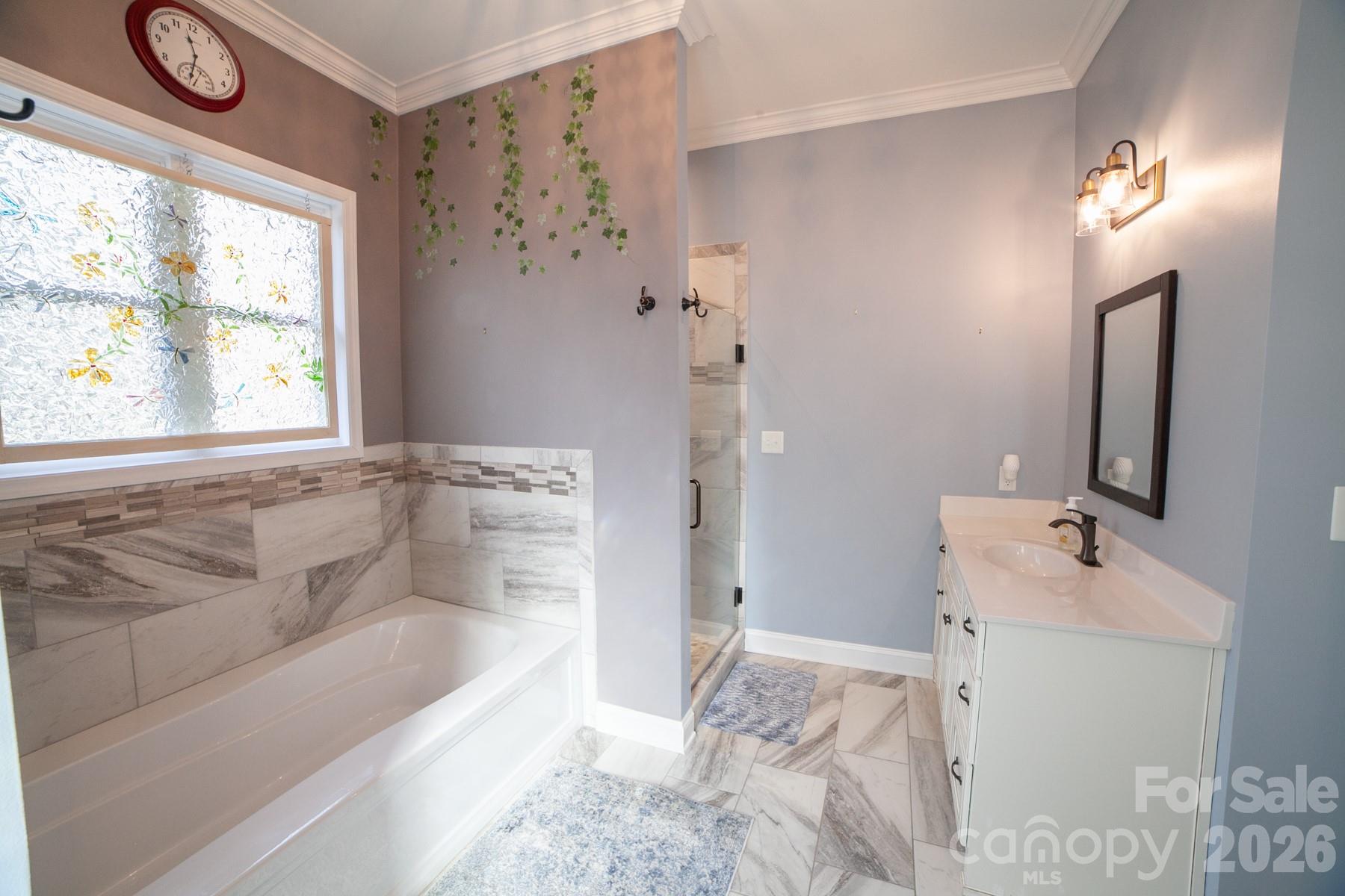 790 Brandon Road Clover, SC 29710 - Photo 19 of 48 a bathroom with a tub sink and mirror