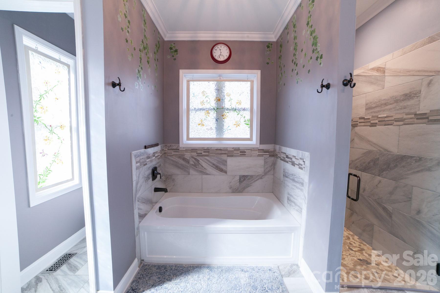 790 Brandon Road Clover, SC 29710 - Photo 20 of 48 a white bath tub sitting next to a window