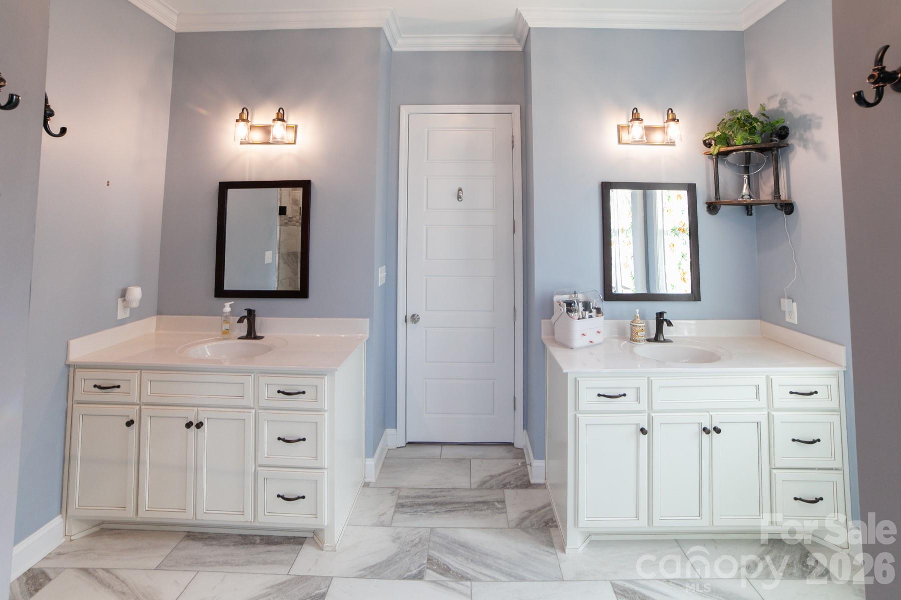 790 Brandon Road Clover, SC 29710 - Photo 21 of 48 a spacious bathroom with a double vanity sink and a mirror