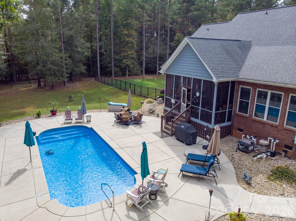 790 Brandon Road Clover, SC 29710 - Photo 44 of 48 a view of a house with swimming pool and sitting area