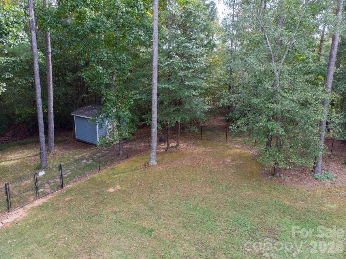 790 Brandon Road Clover, SC 29710 - Photo 46 of 48 a backyard of a house with lots of green space