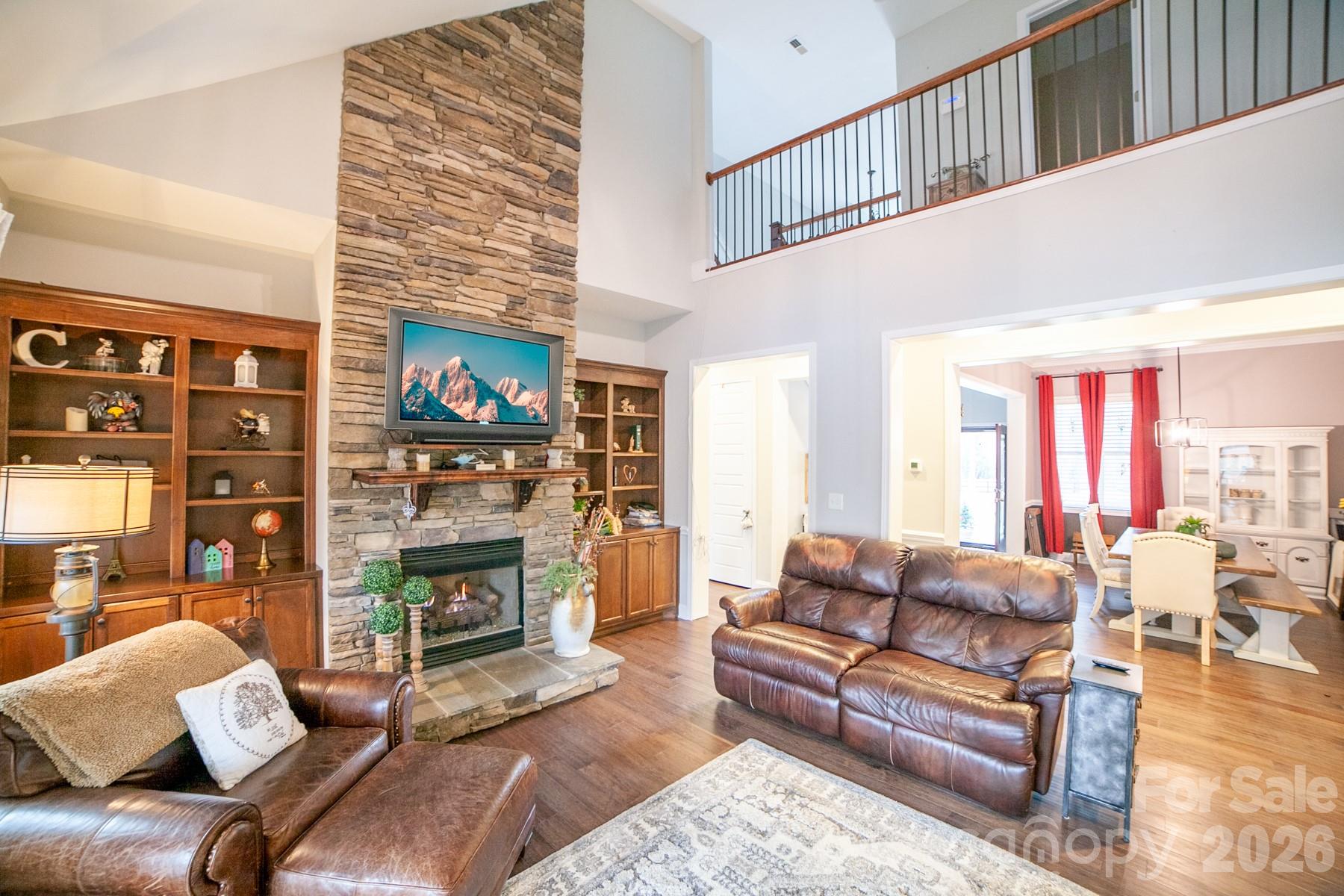 790 Brandon Road Clover, SC 29710 - Photo 7 of 48 a living room with furniture a fireplace and a flat screen tv