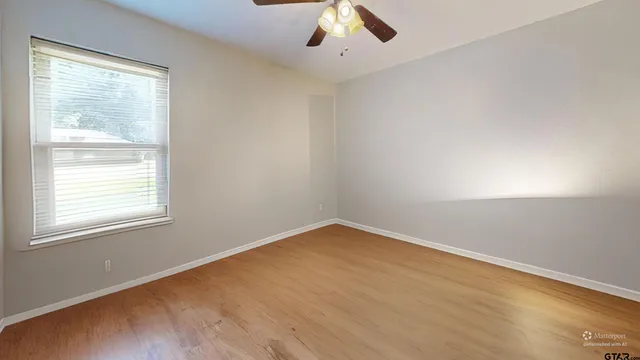 an empty room with a window