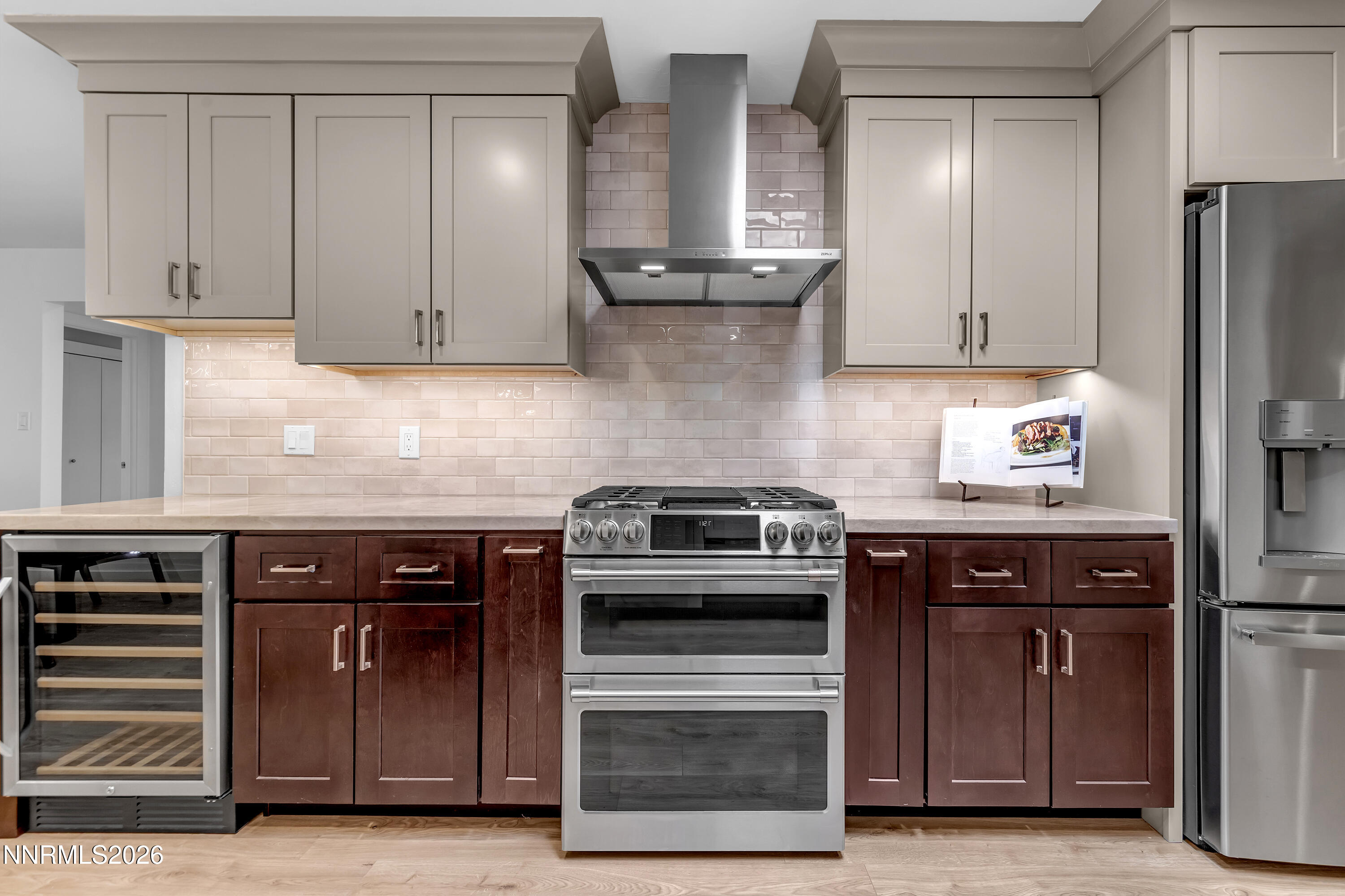 4915 Lakeridge Terrace West Reno, NV 89509 - Photo 11 of 41 a kitchen with stainless steel appliances granite countertop a stove and a refrigerator