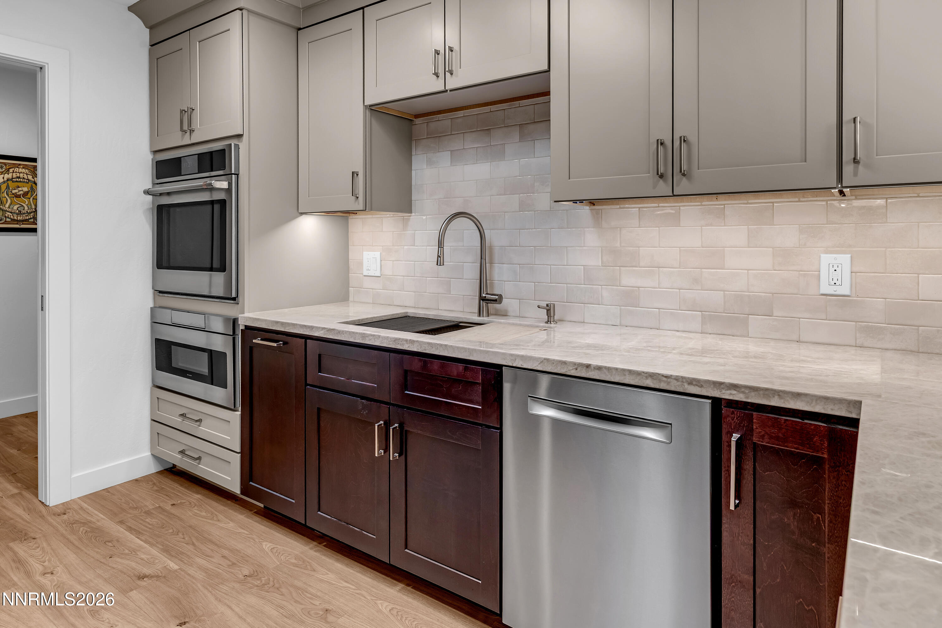 4915 Lakeridge Terrace West Reno, NV 89509 - Photo 12 of 41 a kitchen with granite countertop a sink stainless steel appliances and cabinets