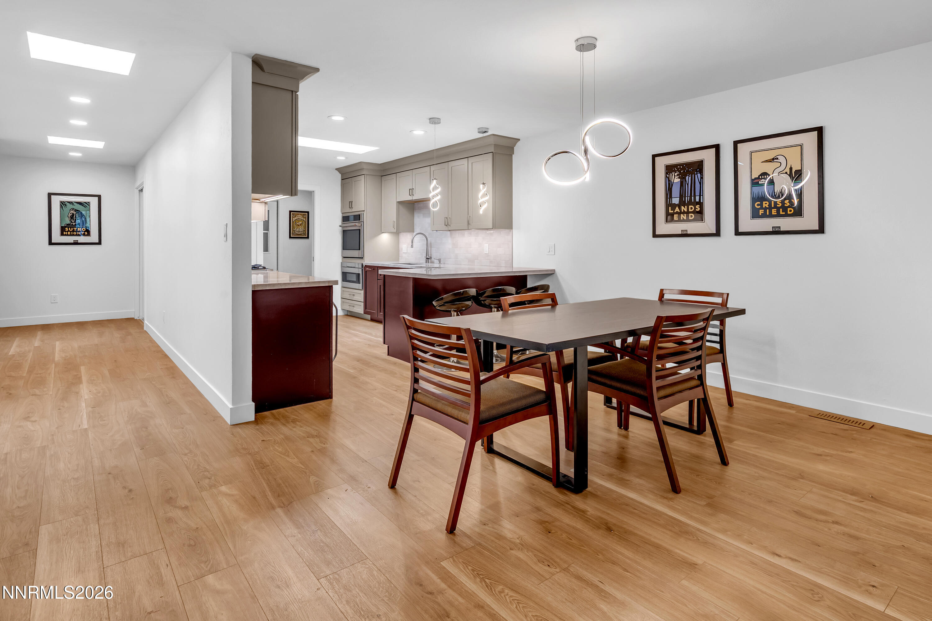 4915 Lakeridge Terrace West Reno, NV 89509 - Photo 21 of 41 a view of a dining room with furniture and wooden floor