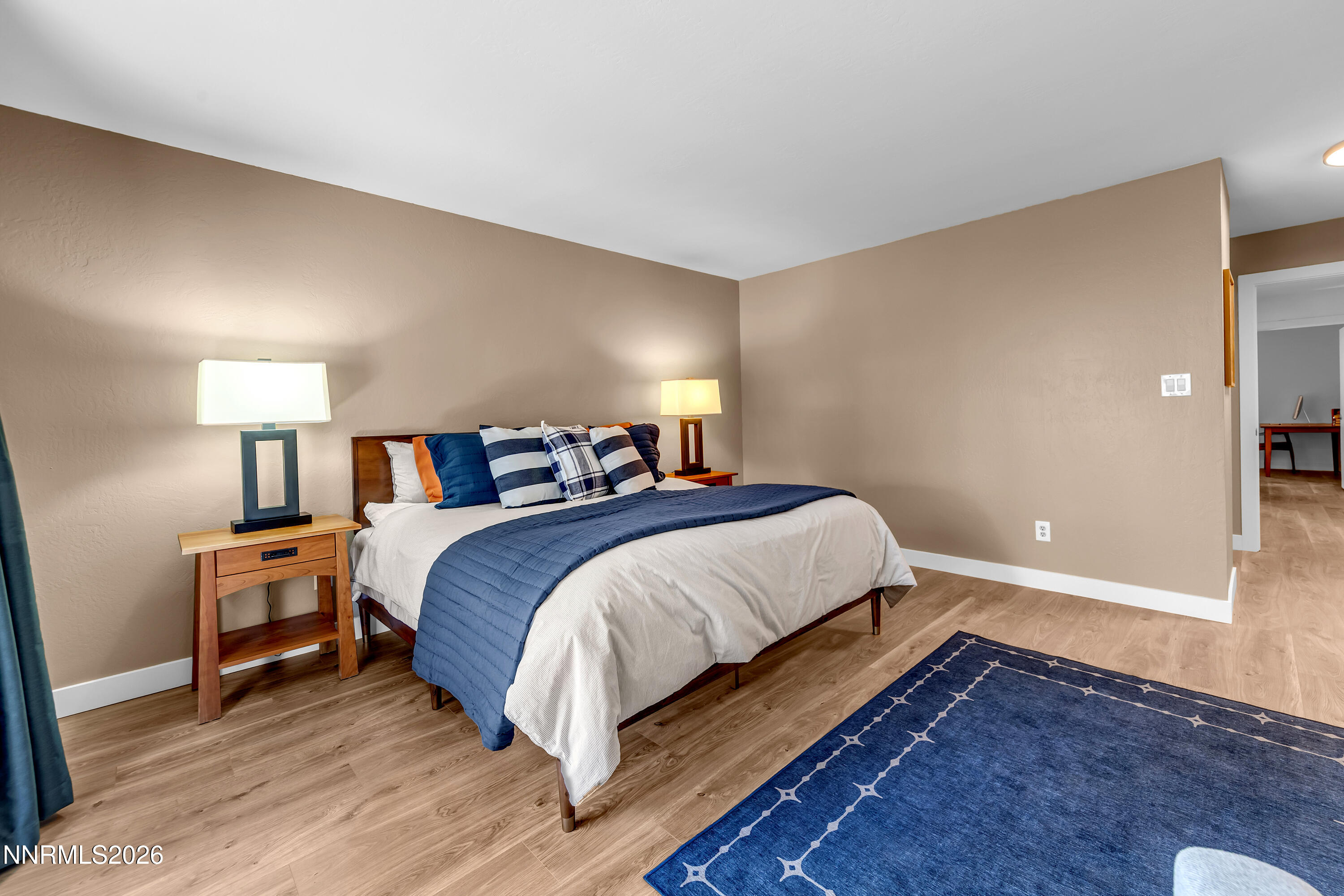 4915 Lakeridge Terrace West Reno, NV 89509 - Photo 23 of 41 a bedroom with a bed and a night stand